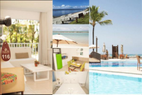Marupiara, flat equipado no melhor trecho da praia de Muro Alto, beira-mar com piscina, varanda, restaurante, estacionamento e wi-fi, a 10' de carro de Porto de Galinhas
